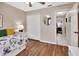 Bedroom with wood floors, a closet and a window, offering a cozy space at 1020 N Orange Ave, Orange City, FL 32763