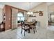 Inviting dining room with neutral paint, chandelier, and an arched window at 1020 N Orange Ave, Orange City, FL 32763