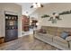 Inviting living room with hardwood flooring, neutral paint and comfortable seating at 1020 N Orange Ave, Orange City, FL 32763