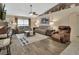 Open living room with vaulted ceilings and hardwood floors provides a comfortable space at 1020 N Orange Ave, Orange City, FL 32763