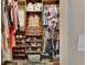 Spacious walk-in closet with custom shelving and plenty of hanging space for clothes and accessories at 1020 N Orange Ave, Orange City, FL 32763