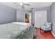 Bedroom featuring cherry floors, a chair, and a closet at 1020 Orange Camp Rd, Deland, FL 32724