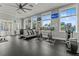 Bright, well-lit gym featuring state-of-the-art cardio equipment and TVs for entertainment at 10460 Burrows St, Orlando, FL 32832