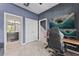 Second floor flex space currently being used as home office; also showing staircase and bathroom entrance at 10460 Burrows St, Orlando, FL 32832