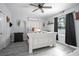 Bedroom with rustic decor, a decorative bed, and a window with dark curtains at 1094 Lolita St, Orange City, FL 32763