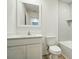 Neutral bathroom featuring a white vanity and shower at 1161 Kenway Ave, Deltona, FL 32738