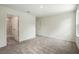 Neutral bedroom featuring an attached bathroom at 1161 Kenway Ave, Deltona, FL 32738
