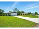 Lovely single-Gathering home with an extra long driveway and a convenient two-car garage at 1161 Kenway Ave, Deltona, FL 32738