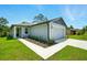Attractive single-Gathering home with a two-car garage and a beautifully landscaped entrance at 1161 Kenway Ave, Deltona, FL 32738