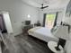 Bedroom featuring sliding glass doors to patio and wood floors at 1215 N Boston Ave, Deland, FL 32724
