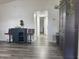 Elegant entryway with hardwood floors and stylish furnishings, offering a warm welcome at 1215 N Boston Ave, Deland, FL 32724