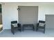 Inviting front porch featuring comfortable seating, perfect for relaxing outdoors at 1215 N Boston Ave, Deland, FL 32724