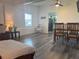 Cozy living room area with an open view to the dining area at 1215 N Boston Ave, Deland, FL 32724