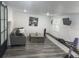 Relaxing living room showcasing a comfortable sofa, stylish coffee table, and modern accents at 1215 N Boston Ave, Deland, FL 32724