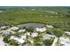 Community aerial view near mangrove wetlands with private parking at 122 Cedar Dunes Dr, New Smyrna Beach, FL 32169