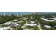 An aerial view showcasing the community, featuring well-maintained landscaping and private parking at 122 Cedar Dunes Dr, New Smyrna Beach, FL 32169