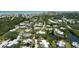 Community aerial view of condominiums near a pond with easy access to the beach at 122 Cedar Dunes Dr, New Smyrna Beach, FL 32169