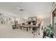 Spacious living room with elegant furnishings, neutral tones, decorative mirrors, and a bright, airy atmosphere at 123 Wood Ibis Ct, Daytona Beach, FL 32119