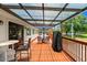 Outdoor patio with wooden deck, providing ample seating and dining space for community residents at 123 Wood Ibis Ct, Daytona Beach, FL 32119
