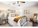 Bright bedroom with a comfortable bed, stylish decor, and natural light at 1261 Burning Tree Ln, Winter Park, FL 32792