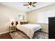 Cozy bedroom with neutral tones, comfortable bed, and natural light at 1261 Burning Tree Ln, Winter Park, FL 32792