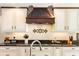 Close-up of kitchen countertop with modern faucet and a decorative backsplash at 1261 Burning Tree Ln, Winter Park, FL 32792
