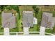Aerial view of a well-maintained property featuring a pool, patio area, and lush landscaping at 1314 Lake Baton Dr, Deltona, FL 32725