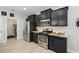 Well-equipped kitchen with stainless steel appliances and modern cabinets at 1314 Lake Baton Dr, Deltona, FL 32725