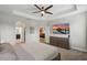 Spacious main bedroom with tray ceilings and open to ensuite bathroom at 1314 Lake Baton Dr, Deltona, FL 32725