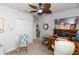 Office space with ceiling fan, wooden desk, computer monitor, printer and chair at 1323 Donatello Ln, Winter Haven, FL 33884