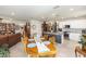 Open-concept living space combining the dining area, kitchen, and living room for easy entertaining at 1323 Donatello Ln, Winter Haven, FL 33884