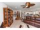 Inviting living space offering a seamless flow between the living room, dining area, and kitchen at 1323 Donatello Ln, Winter Haven, FL 33884