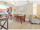 Open concept dining room with views into the kitchen and living area at 1420 N Grandview Ave, Daytona Beach, FL 32118