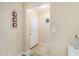 Bright foyer with decorative accents, light-colored walls, and wood-look flooring at 1420 N Grandview Ave, Daytona Beach, FL 32118