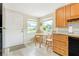 Charming eat-in kitchen featuring lots of natural light and wooden cabinets at 1420 N Grandview Ave, Daytona Beach, FL 32118