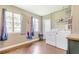 Functional laundry room with natural light and a modern washer and dryer set for convenience at 1420 N Grandview Ave, Daytona Beach, FL 32118