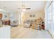 Inviting living room featuring light-colored walls, wood-look floors, and comfortable seating at 1420 N Grandview Ave, Daytona Beach, FL 32118