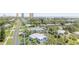 Charming single-story homes nestled among lush trees and palm trees on a quiet street near the beach at 1420 N Grandview Ave, Daytona Beach, FL 32118