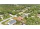 Neighborhood aerial view surrounded by lush trees featuring well-maintained lawns in a desirable residential area at 1431 1St Ave, Deland, FL 32724