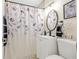 Bathroom with a vanity and a shower featuring decorative tile work and modern fixtures at 1455 Whitewood Dr, Deltona, FL 32725