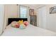Cozy bedroom featuring bright natural light and comfortable furnishings at 1455 Whitewood Dr, Deltona, FL 32725