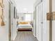 Cozy bedroom with a comfortable bed, neutral decor, and soft natural light at 1455 Whitewood Dr, Deltona, FL 32725