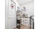 Organized laundry room with modern shelving, white cabinets, and in unit washer and dryer at 1455 Whitewood Dr, Deltona, FL 32725