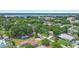 Neighborhood aerial view highlighting the lake, surrounding greenery, and well-kept residential areas at 1612 W Grant St, Orlando, FL 32805