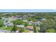 Overhead view of houses, green spaces, and a busy commercial street, showcasing location at 1612 W Grant St, Orlando, FL 32805