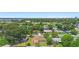 An aerial shot showcasing a neighborhood with mature trees and well-maintained streets at 1612 W Grant St, Orlando, FL 32805