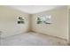 Bedroom featuring two windows allowing natural light at 1612 W Grant St, Orlando, FL 32805