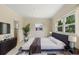 A soothing bedroom with a cozy rug, a modern bed and a calming ambiance at 1612 W Grant St, Orlando, FL 32805