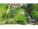 Aerial view of the backyard showing the gazebo, firepit and mature landscaping at 1702 Palmetto Ave, Deland, FL 32724