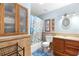 Bathroom with tub, cabinet and drawers, toilet, and tile floor at 1702 Palmetto Ave, Deland, FL 32724